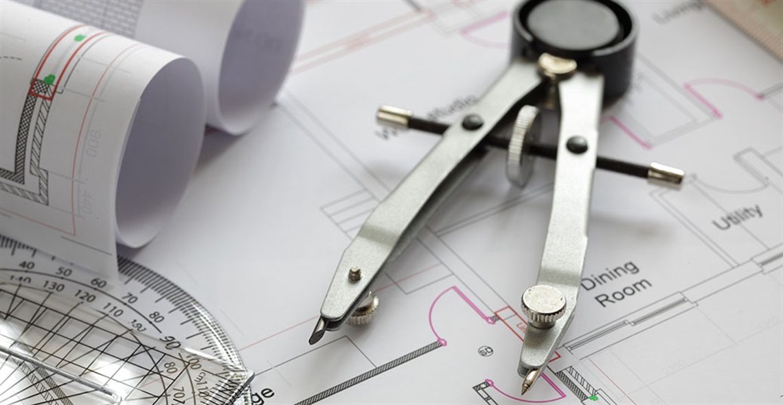Blueprints and drawing tools concept for construction or development