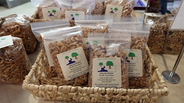 Closeup view of bags of pecans in woven basket