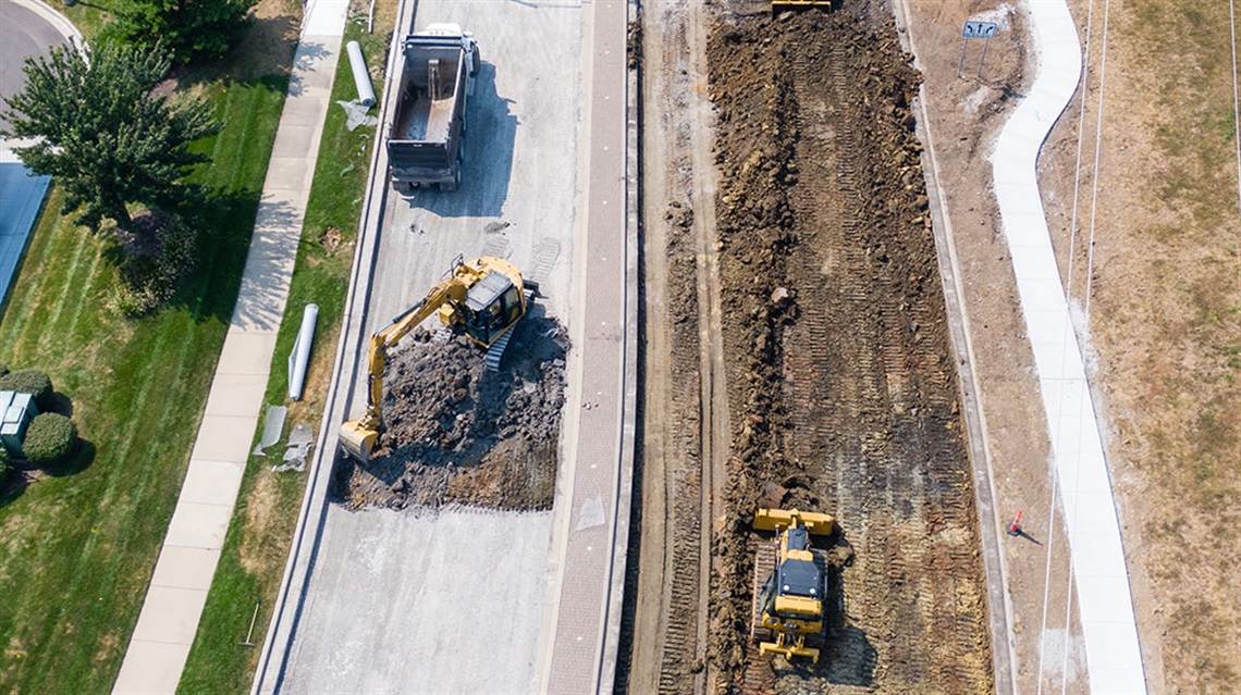 bird's-eye view of equipment doing street reconstruction