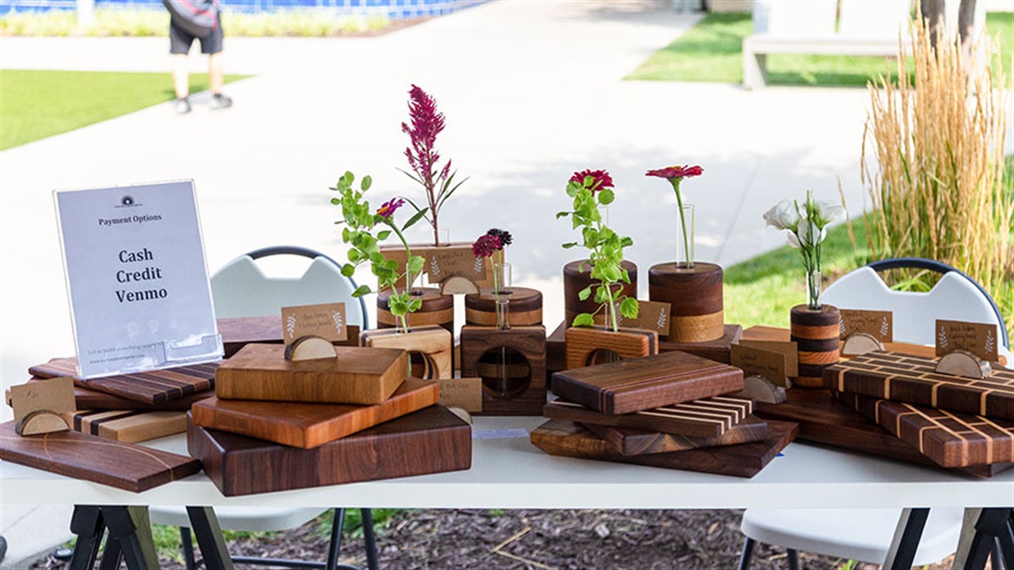 artist booth of wood cutting boards