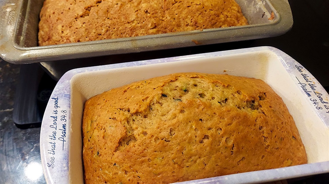 two loaves of zucchini bread in pans