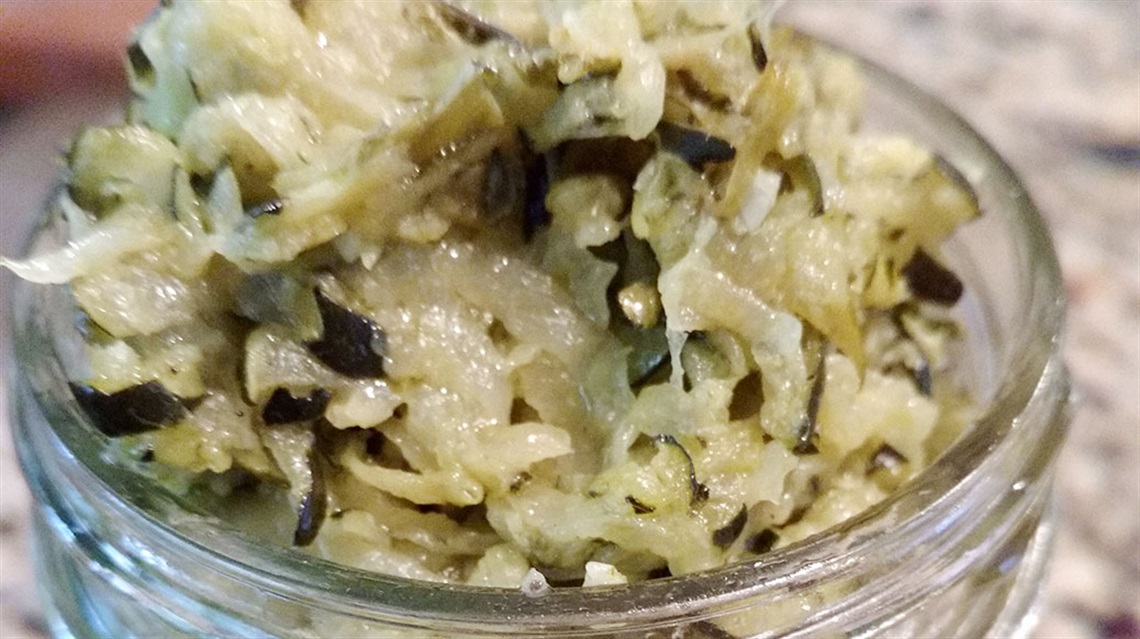 closeup of zucchini butter in glass jar