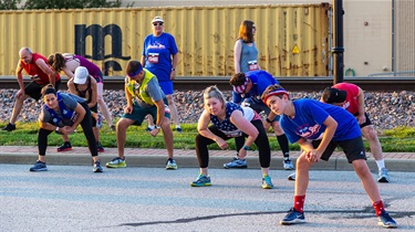 Runners stretching before race