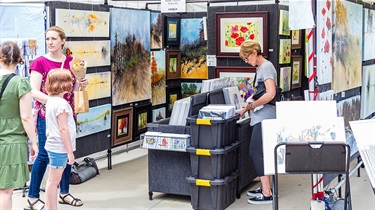 Customers shopping for paintings