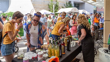 People tasting wine