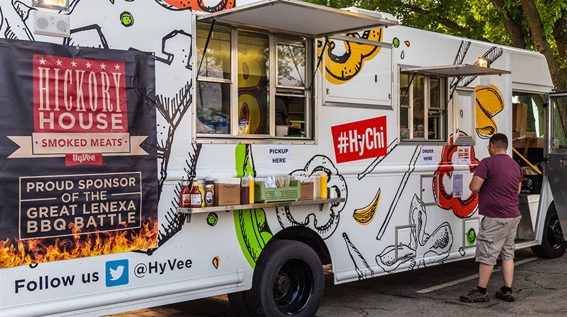 man ordering from food truck