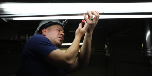 Bobby working on electrical wiring