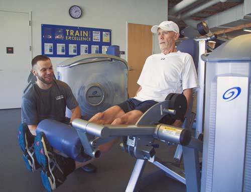 Josh working as trainer with man