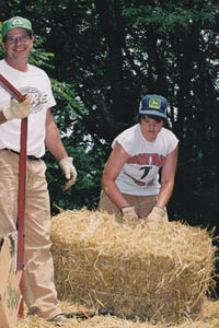 Steven moving hay bales as a kid