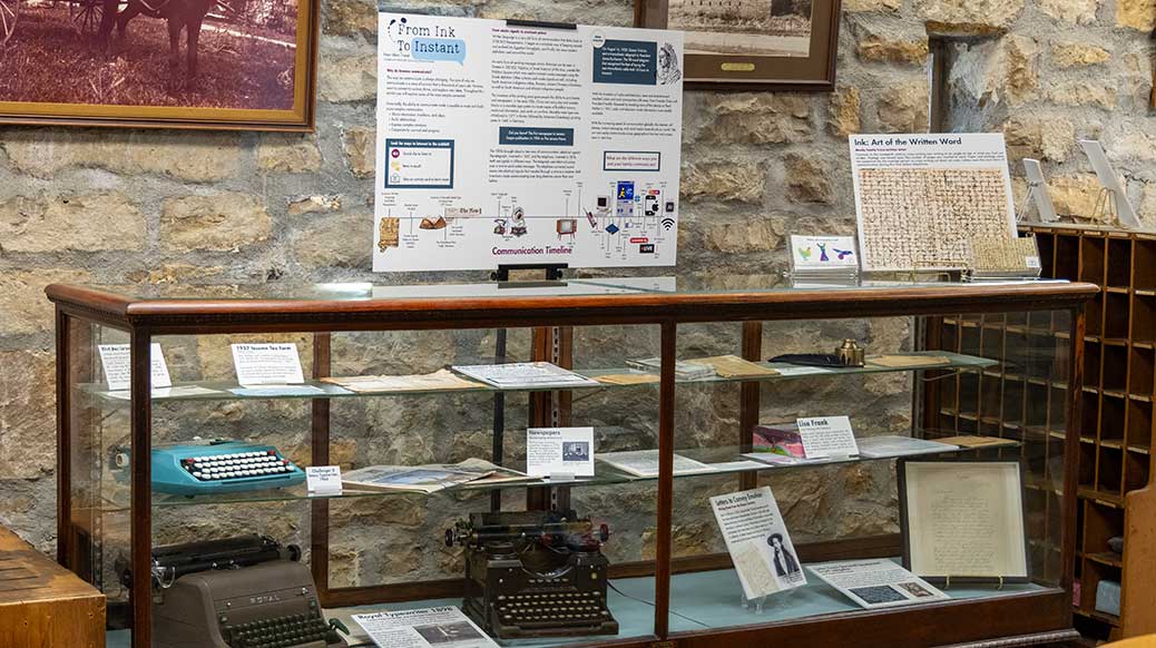 Display case for exhibit about how communication has evolved over time