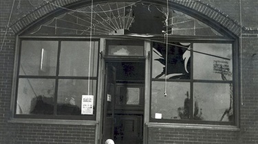 armers State Bank building front with broken windows (circa 1908)