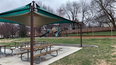 Park shelter with picnic tables