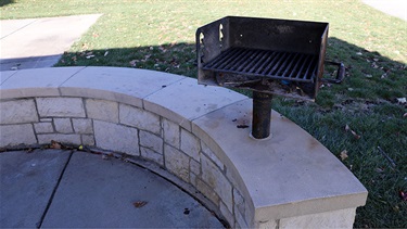 Grill in stone wall