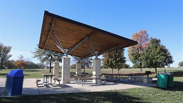 Park shelter with picnic tables