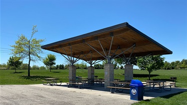 Park shelter with picnic tables