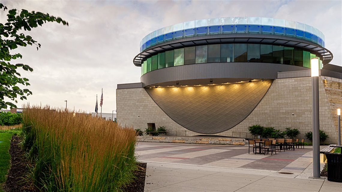 outdoor stage and Lenexa Commons at dusk