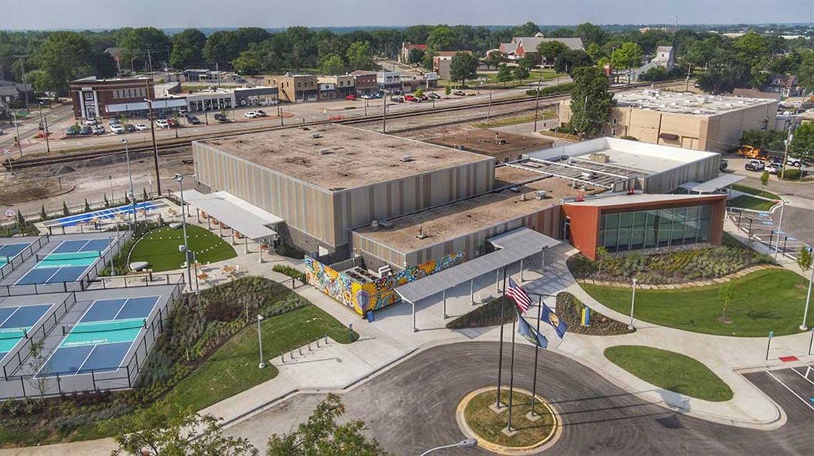 Bird's-eye view of Old Town Activity Center facility, pickleball courts, porch area and circle drive