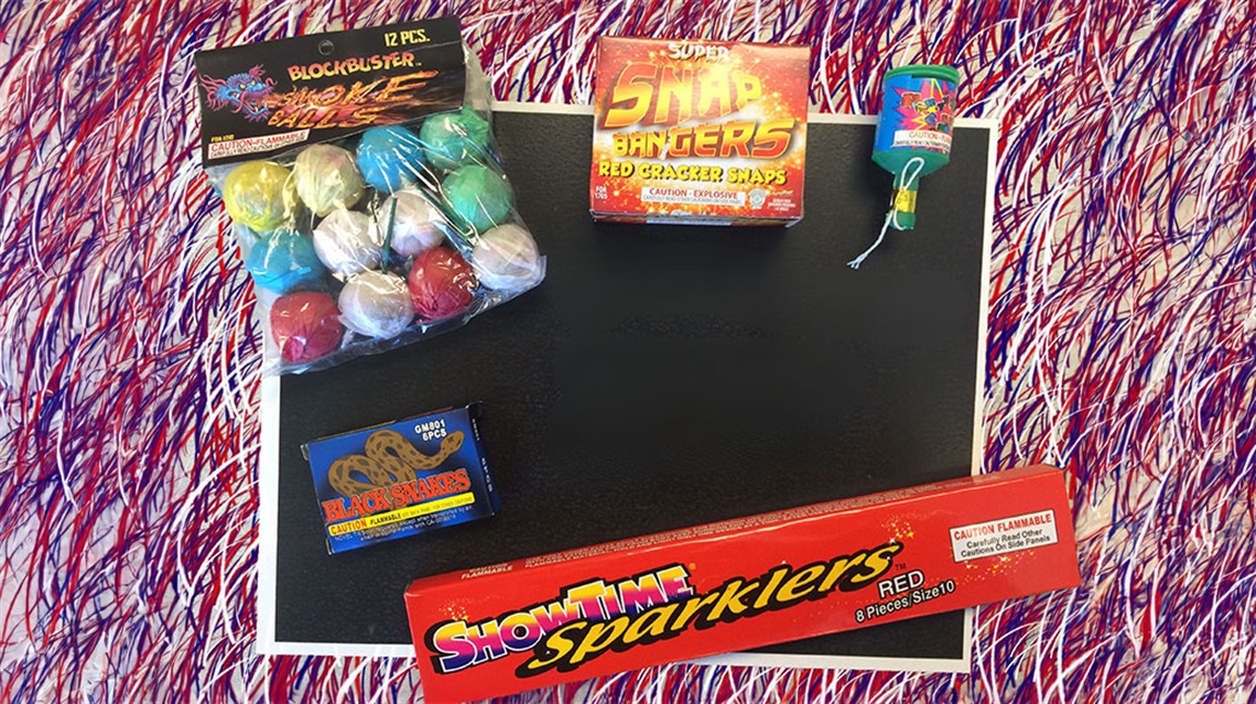 Assorted novelty fireworks items like smoke bombs and sparklers