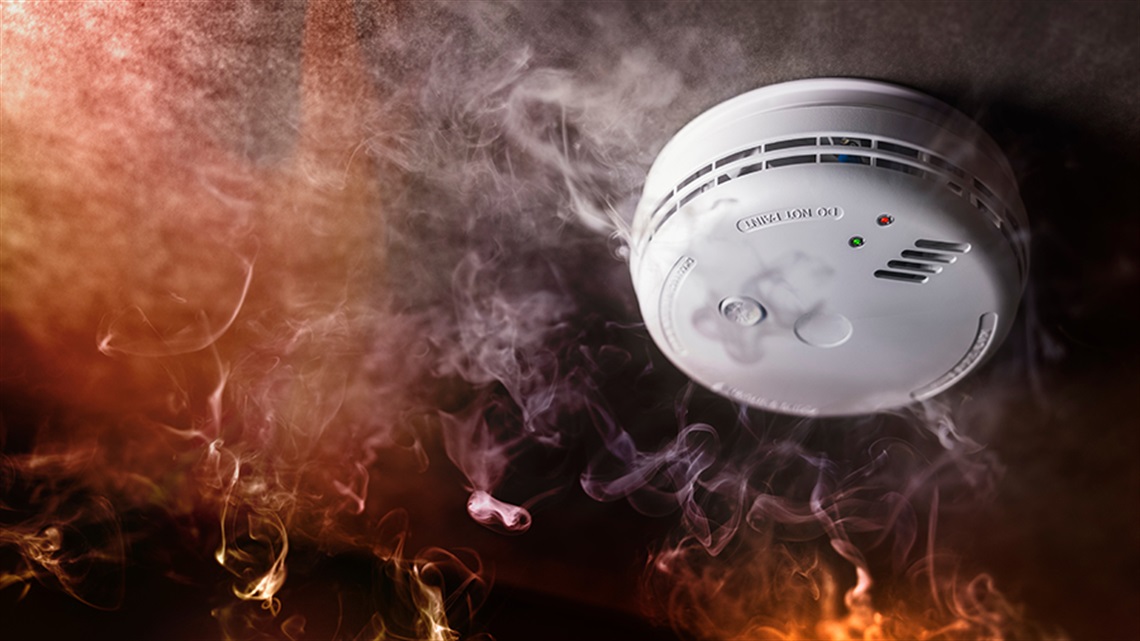 Smoke detector surrounded by smoke