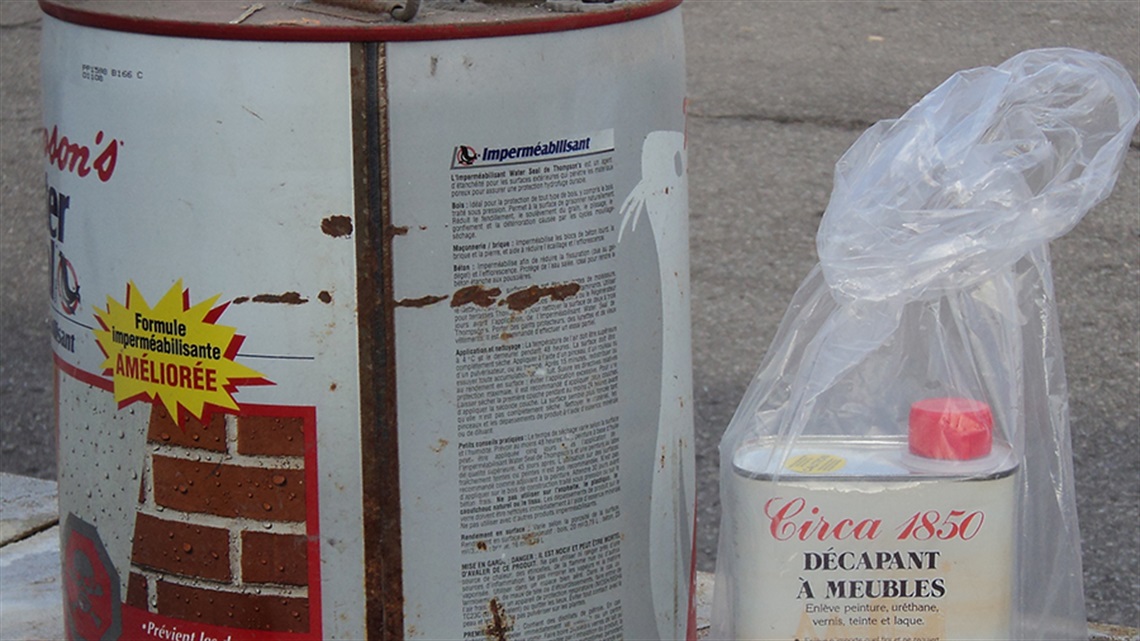 Can and bottle of hazardous waste