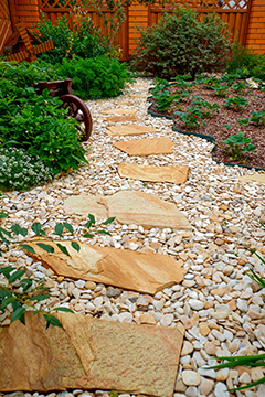 Stone permeable pavers create a pretty path