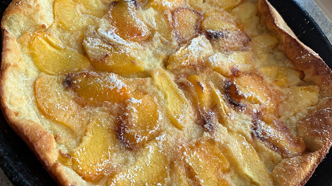 Closeup of whiskey peach clafloutis