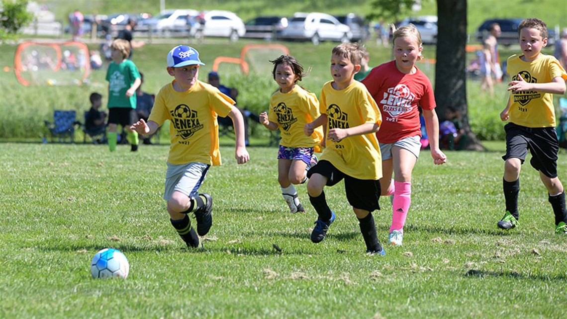 boys and girls playing soccer