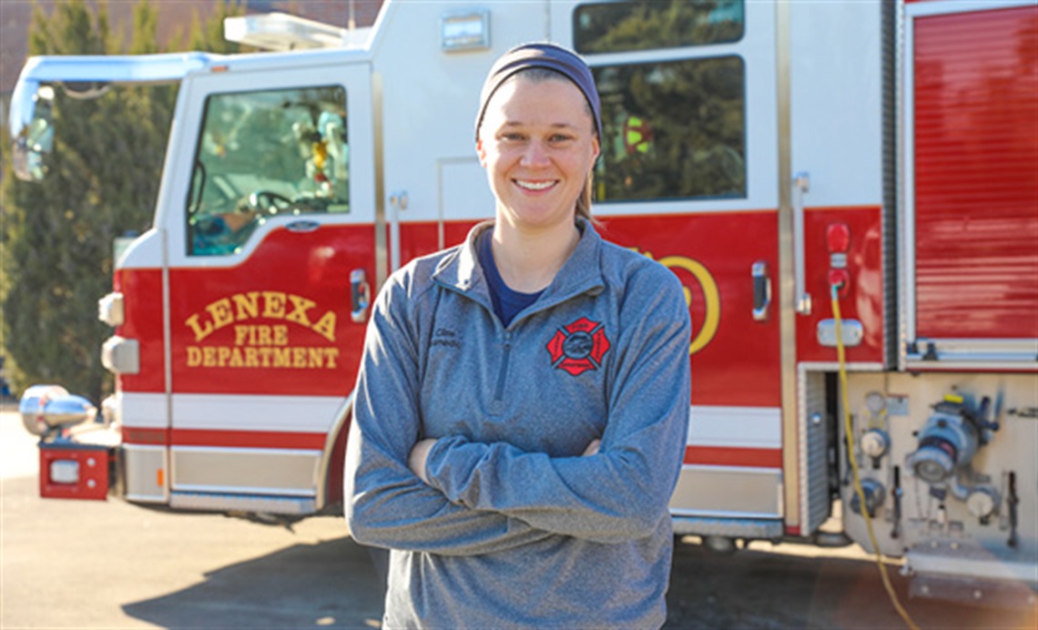 Katie Cline in front of Lenexa fire truck
