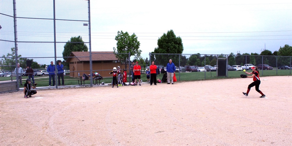 Girls playing softball